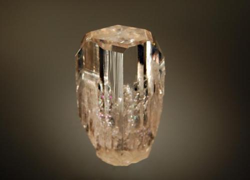 Topaz
Mango, Shigar Valley, Gilgit-Baltistan, Pakistan
2.1 x 3.4 cm.
A gemmy loose crystal of sherry-colored topaz. (Author: crosstimber)