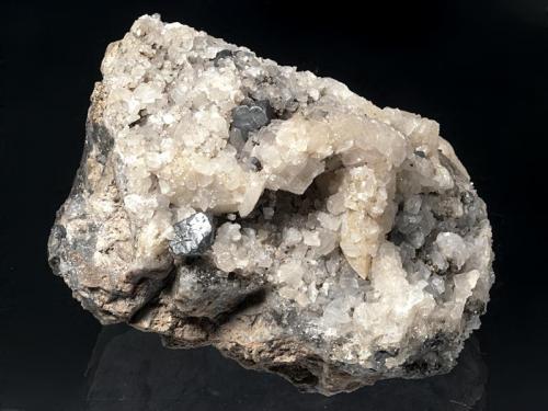 Acanthite
Monte Narba, Sardinia, Italy
8x6x6 cm
Two big, up to 1 cm Acanthite crystals with many smallers in Calcite and Quartz, from an old classic italian locale. (Author: Simone Citon)