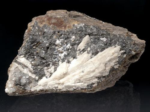 Freieslebenite
Hiendelaencina, Guadalajara, Castile-La Mancha, Spain
10x7x5 cm
Freieslebenite
Hiendelaencina, Guadalajara, Castile-La Mancha, Spain
10x7x5 cm
Old classic, rich, large specimen with Freieslebenite crystals in matrix associated with bladed, whitish Baryte. Ex Peter Maurer. (Author: Simone Citon)