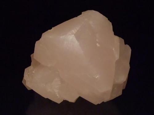 Calcite
Verkhnii Mine, Dal’negorsk, Primorskiy Kray, Russia
13x10.5x10.5 cm
A large light pink calcite, the prism faces are all complete but two of them are roughly formed. Collected 2012. (Author: Greg Lilly)