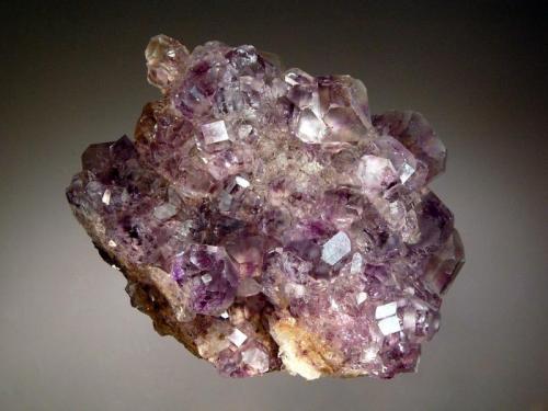 Fluorite
Shangbao Mine, Leiyang Co., Hunan Prov., China
5.9 x 7.5 cm
Glassy fluorite crystals with pale purple centers, frosted octahedral faces, and transparent cube faces. (Author: crosstimber)