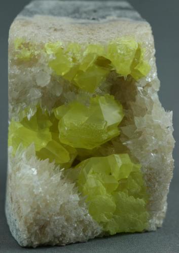 Sulfur with Calcite
Boling Dome, Newgulf, Wharton Co., Texas, USA
4.0cm x 5.0cm (Author: rweaver)