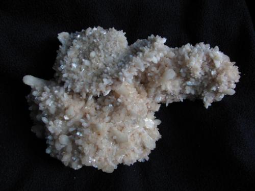 Stilbite + Chabazite
Moonen Bay, Isle of Skye, Scotland, UK
19cm x 12cm x 8cm
Large specimen, mostly covered with ’stubby’ stilbite crystals on this side. Self-collected March 2013. (Author: Mike Wood)