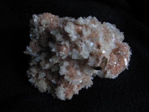 Stilbite + Chabazite
Moonen Bay, Isle of Skye, Scotland,UK
11cm x 10cm x 6cm high
Same specimen as above. There is a bit of contacting on top of the specimen. (Author: Mike Wood)