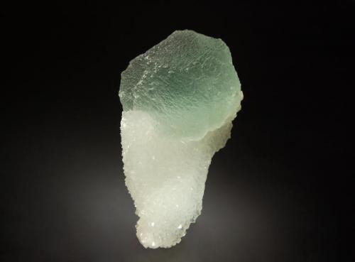 Fluorite
Xiefang Mine, Ruijin Co., Ganzhou Pref., Jiangxi Prov., China
3.6 x 6.4 cm
Mint green cuboctahedral fluorite crystal with polysynthetic growth on a triangular shard of white quartz. (Author: crosstimber)