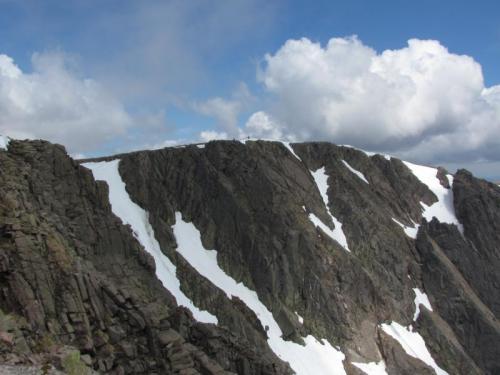 Summit of Braeriach (1296m) in top of huge south-facing cliffs, all granite. I spent a while searching with binoculars but failed to spot any pegmatite veins. Fortunately. (Author: Mike Wood)