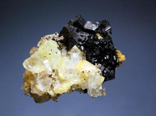 Babingtonite
Qiaojia Co, Zhaotong Pref., Yunnan Prov., China
4.8 x 5.9 cm
Tabular black babingtonite crystals associated with pale green prehnite and colorless quartz crystals (Author: crosstimber)