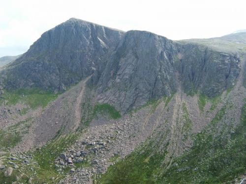 View of Carn Etchachan (1120m) and Shelter Stone Crag (just right of the highest point, between the two large scree fans) from the North, where the ’crystal cave ’ is - more of this later. Photo taken July 2006. (Author: Mike Wood)