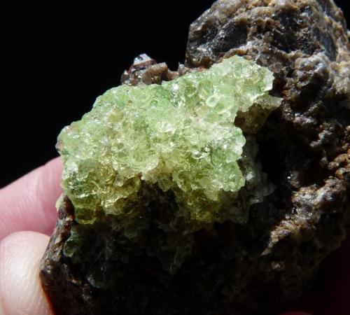 Opal (variety hyalite) on smoky quartz.
Erongo mountains; Namibia
60 x 42 x 24 mm
The hyalite opal (32 x 22 mm) has an even better colour in person, very much like jelly. (Author: Pierre Joubert)