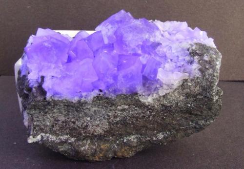 Fluorite,
Frazer’s Hush Mine, 295 Level, Rookhope, Weardale, Co Durham, England, UK.
85 x 55 mm 
under LW UV (Author: nurbo)