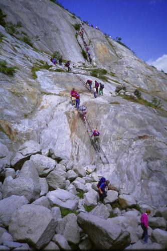 Then you have to descend these steel ladders to get to the glacier (there are two sets of parallel ladders these days).
Photo scanned from slide. (Author: Mike Wood)