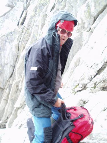 Photo of me at the same time, looking disgusted. We retreated, abseiling in some places, as the weather worsened. Good call as it turned out, it snowed all day above 2500m. (Author: Mike Wood)