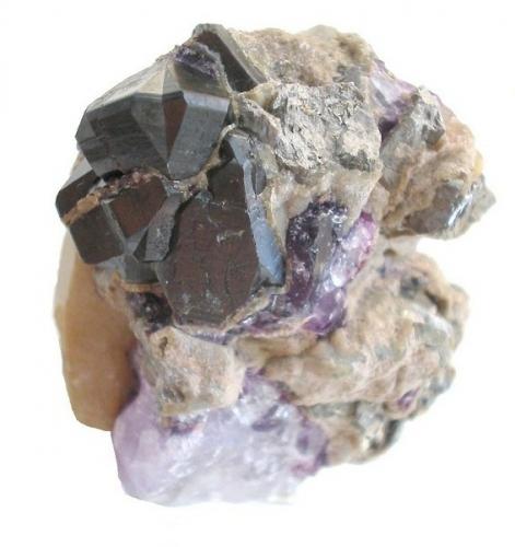 Cassiterite, fluorite, arsenopyrite
Sauberg mine, Ehrenfriedersdorf, Erzgebirge, Saxony, Germany
5,5 x 4,5 cm (Author: Andreas Gerstenberg)