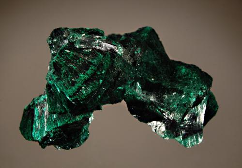 Malachite
Mashamba West Mine, Kolwezi, Katanga Prov., DR Congo
4.5 x 6.0 cm
Clusters of dark green primary malachite. (Author: crosstimber)