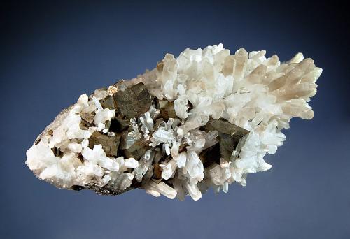 Arsenopyrite
Stari Trg Mine, Trepca Complex, Kosovska-Mitrovica, Kosovo
5.2 x 9.7 cm
Sharp metallic silver arsenopyrite crystals set among opaque milky quartz crystals. (Author: crosstimber)