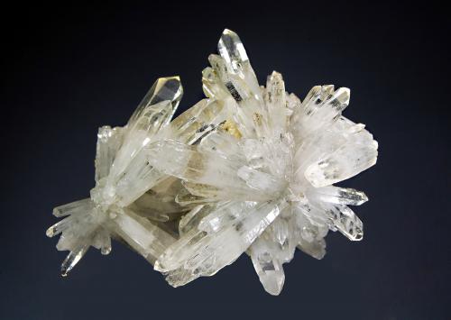 Quartz
Trepca complex, Kosovska Mitrovica, Kosovo
6.1 x 7.3 cm
Transparent quartz crystals with minor pyrite and chlorite. Mined in 2012. (Author: crosstimber)