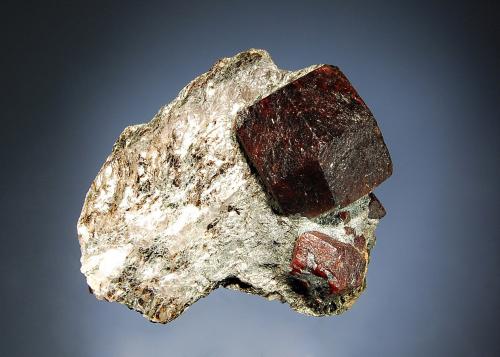 Almandine
Gaisberg Glacier, Otztal, Tyrol, Austria
6.5 x 7.0 cm
A mica schist matrix hosting a few reddish-brown crystals of almandine. (Author: crosstimber)