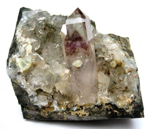 Quartz, prehnite
Brandberg Area, Erongo Region, Namibia
Specimen size 8 cm, main quartz measures 6 cm

Quartz (colourless with a purple amethyst phantom inside) and small prehnite ball attached (Author: Tobi)