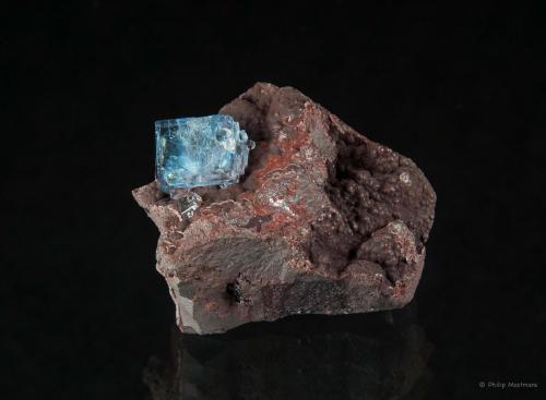 Fluorite, Hematite
Florence mine, Egremont, Cumbria, England
Fluorite crystal about 8-9mm (Author: Philip Mostmans)