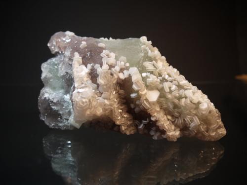 Calcite, Fluorite
Xianghuapu Mine, Xianghualing Sn-Polymetallic Ore Field, Linwu County, Chenzhou Prefecture, Hunan Province, China
17.0 x 9.5 cm
Colorless hexagonal calcite crystals to one centimeter on crystallized green and purple fluorite. (Author: Don Lum)