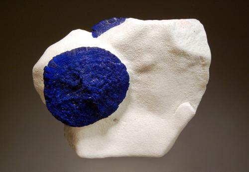 Azurite
Malbunka Copper Mine, Areyonga, Gardiner Range, Northern Territory, Australia
6.2 x 6.2 cm
Bright blue disks of azurite, known as “azurite suns” embedded in white kaoilinitic siltstone. (Author: crosstimber)