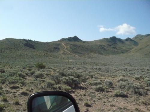 One of the steepest parts of the road in the distance.  Here is where we leave the valley floor. (Author: John S. White)