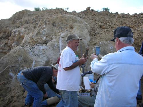 Paul Geffner holding a large quartz scepter from a pocket. (Author: Tony L. Potucek)