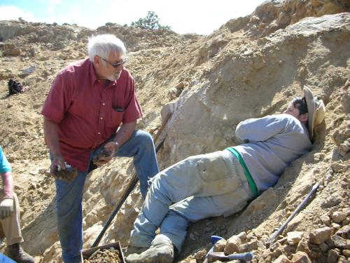 Ian Merkel attempting to reach more specimens from Ronna’s pocket.  Jerry Rosenthal, who worked the pocket with Ronna is standing next to Ian. (Author: Tony L. Potucek)