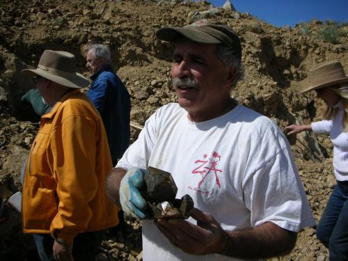 Paul Geffner holding likely the best specimen from Ronna’s pocket & a significant quartz from Petersen Mtn.  Undamaged and not repaired! (Author: Tony L. Potucek)