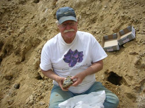Ken Roberts, veteran mineral dealer, with another quartz find. (Author: Tony L. Potucek)