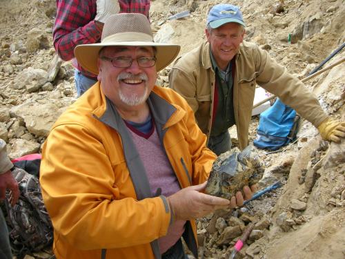 Proud papa Skirkanich holding his newly found quartz specimen.  Scott Werschky coveting his find in the background. (Author: Tony L. Potucek)