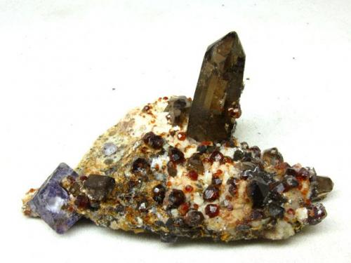 Spessartine with smoky Quartz, Fluorite
Yunxiao, Zhangzhou, Fujian, China
3.5×5×7 cm
 (Author: chinamineral)