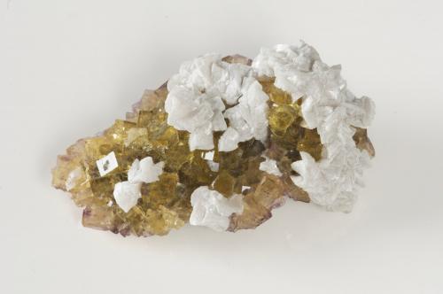 Dolomite on Fluorite<br />Moscona Mine, El Llano, Solís, Corvera de Asturias, Comarca Avilés, Principality of Asturias (Asturias), Spain<br />58x35x23 mm<br /> (Author: steven calamuci)