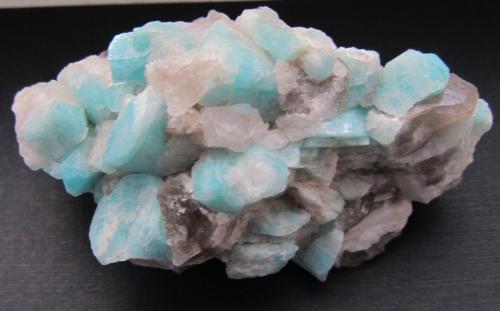 Quartz (var. smoky) Microcline (var. amazonite) and Albite (var. cleavelandite)<br />Crystal Peak area, Teller County, Colorado, USA<br />5.8 x 3.3 x2.6 cm<br /> (Author: steven calamuci)