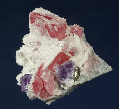 Rhodochrosite with Fluorite<br />Lamo-Longxianggai, Dachang District, Nandan, Hechi Prefecture, Guangxi Zhuang Autonomous Region, China<br />43 x 41 x 38 mm<br /> (Author: GneissWare)