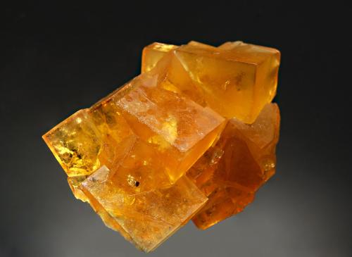 Fluorite
Piboul Mine, Gabrias, Marvejols, Lozère, Languedoc-Roussillon, France
3.4 x 4.5 cm
An intergrown group of sharp, translucent to transparent, lemon-yellow, cubic crystals. (Author: crosstimber)