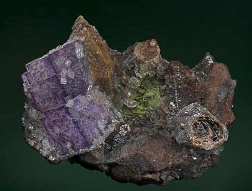 Fluorite, Calcite
Hilarion Mine, Kamariza Mines, Lavrion District Mines, Attikí Prefecture, Greece
8.2 x 5.4 cm
Fluorite and calcite crystals on calcite epimorphs with unidentified green mineral. (Author: am mizunaka)