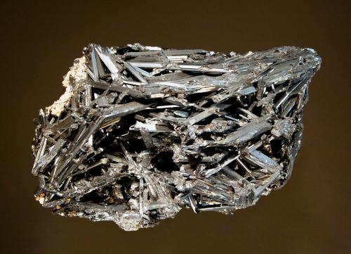 Stibnite
Niccioleta Mine, Massa Marittima, Grosetto Prov., Tuscany, Italy
5.5 x 8.3 cm
Jackstraw aggregate of prismatic lead-gray stibnite crystals. (Author: crosstimber)