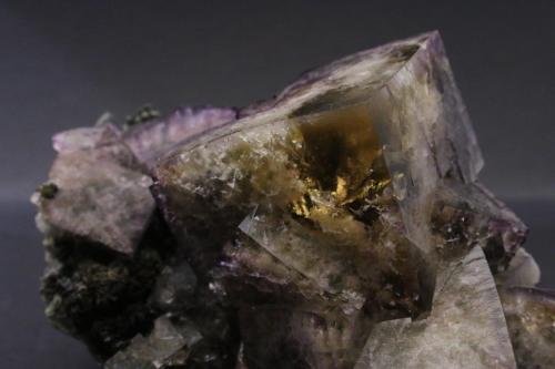 Fluorite, Siderite
Greenlaws Mine, Daddry Shield, Weardale, North Pennines, Co. Durham, England, UK
The main crystal is 4 x 5 cm
Really transparent on the corner, and with some great color contrasts (Author: James)