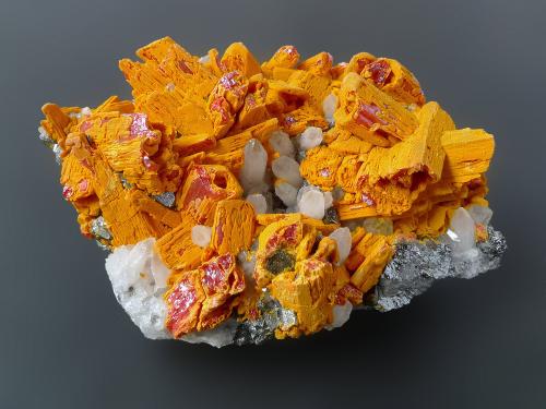 Orpiment pseudomorph after Realgar
Palomo Mine, Castrovirreyna Province, Huancavelica Department, Peru
6.5 x 4.5 x 3 cm
Terminated Realgar crystals are partly or fully replaced by vivid yellow Orpiment, with white quartz and shinny Tetrahedrite in combination. Fantastic color. (Author: xdxucn)