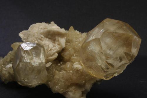 Calcite, Dolomite
La Florida mining area, Sierra de Arnero, Cantabria, Spain
Main crystal is 3 x 3 cm (Author: James)