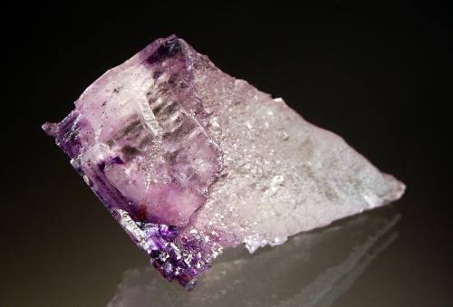 Fluorite
Elmwood Mine, Carthage, Smith County, Tennessee, USA
4.7 x 8.3 cm
The Elmwood mines were noted for producing these naturally etched fluorite crystals. These fluorites generally consist of a etched cone-shaped interior topped by a remnant cubic corner. (Author: crosstimber)