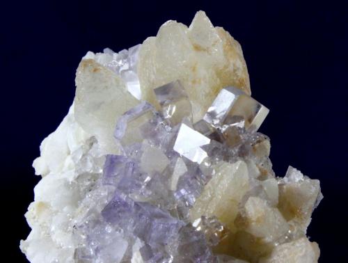 Fluorite, Calcite
Llamas Quarry, Duyos, Obdulia vein, Caravia District, Caravia mining area, Asturias, Spain
11.2 x 5.9 x 4.7 cm
Cubic Fluorite crystals with very well developed dodecahedral bevels.  The Fluorite crystals are colorless and extraordinarily transparent and bright and are on a Calcite matrix with scalenohedral crystals. (Author: Don Lum)