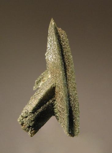 Titanite
Camischotas, Tujetsch, Grischun, Switzerland
2.3 x 4.6 cm
Intersecting twinned crystals of green titanite heavily coated and included with dark green chlorite. (Author: crosstimber)
