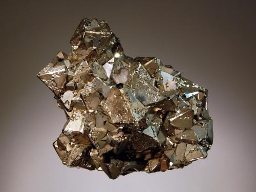 Pyrite
Murgul Cu-Zn-Pb deposit, Murgul, Artvin Province, Black Sea Region, Turkey
6.0 x 6.5 cm
Sharp brassy octahedral crystals of pyrite to 1.5 cm on a massive pyrite matrix. (Author: crosstimber)