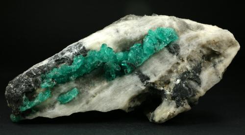 Beryl (variety emerald), Calcite<br />Coscuez mining district, Municipio San Pablo de Borbur, Western Emerald Belt, Boyacá Department, Colombia<br />16x8x7cm<br /> (Author: Fiebre Verde)