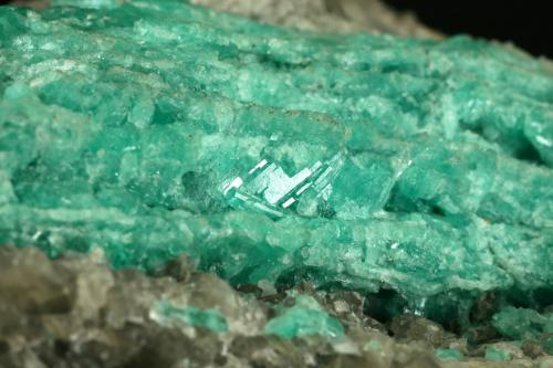 Beryl (variety emerald), Calcite<br />La Pita mining district, Cunas Mine, Municipio Maripí, Western Emerald Belt, Boyacá Department, Colombia<br />Detail - FOV=3cm<br /> (Author: Fiebre Verde)