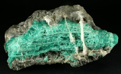 Beryl (variety emerald), Calcite<br />La Pita mining district, Cunas Mine, Municipio Maripí, Western Emerald Belt, Boyacá Department, Colombia<br />12x11x5cm<br /> (Author: Fiebre Verde)