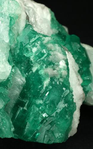 Beryl (variety emerald), Calcite<br />Coscuez mining district, Municipio San Pablo de Borbur, Western Emerald Belt, Boyacá Department, Colombia<br />Detail - FOV=4cm<br /> (Author: Fiebre Verde)