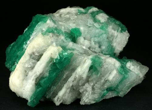 Beryl (variety emerald), Calcite<br />Coscuez mining district, Municipio San Pablo de Borbur, Western Emerald Belt, Boyacá Department, Colombia<br />105x80x60mm<br /> (Author: Fiebre Verde)